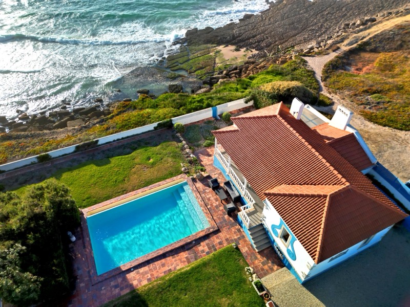Aerial view of Villa Tamar, pool and cliff above the Atlantic
