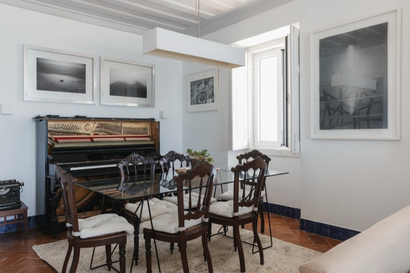 Second living room with the 1907 piano and dining table