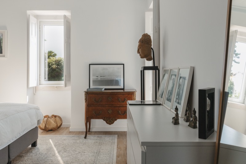 Second angle of the suite, antique chest and morning light through the shutters